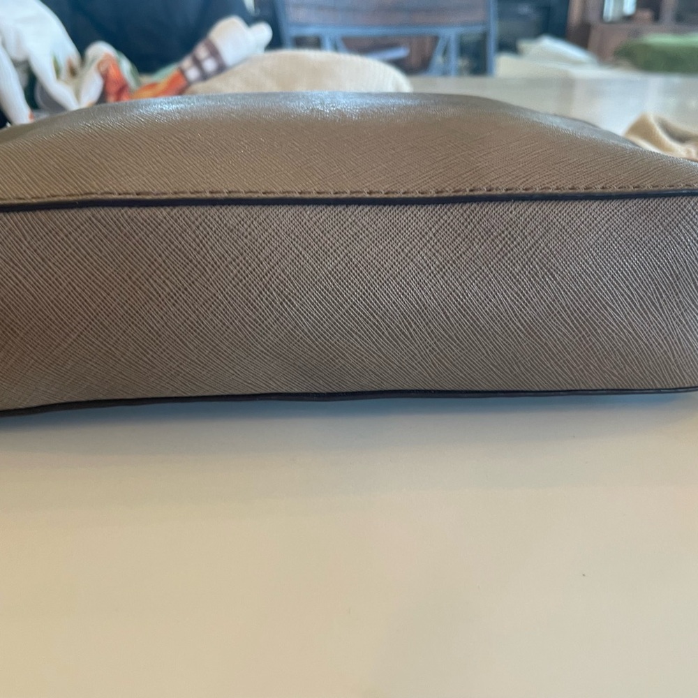 Michael Kors Taupe Leather cross body.